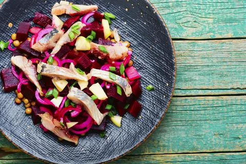 Appetizing herring salad Stock Photos