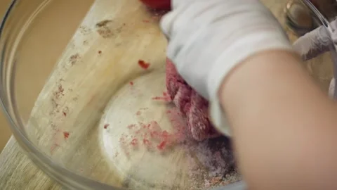 Appetizing immersion blender smoothing roasted beetroot in soft focus, 4K Stock Footage 341111727