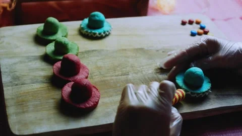 Appetizing ingredient sequence of decorating a cookie base with white trim Stock Footage 342156153