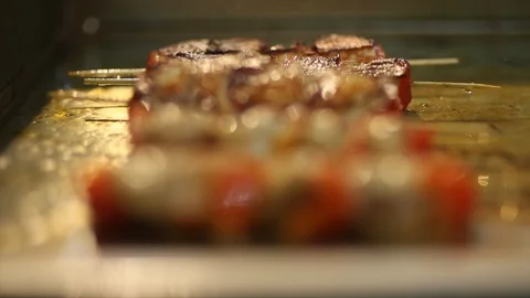 Appetizing kebabs on a heated showcase in a cafe Stock Footage 105081427