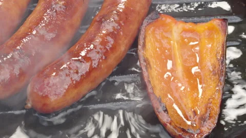 Appetizing macro image of seared sausage with glossy glaze Stock Footage 325838766