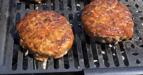 Appetizing Meat Cutlets fried on Cast Iron Grill. Meat in Sauce. Heat Coals Stock Footage 132310866
