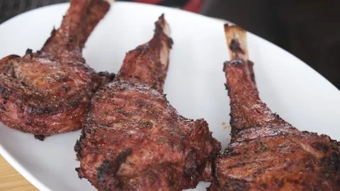 Appetizing meat steak on a white plate. Close up Stock Footage 131023444