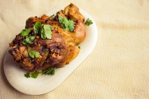 Appetizing meat on a white plate. Stock Photos