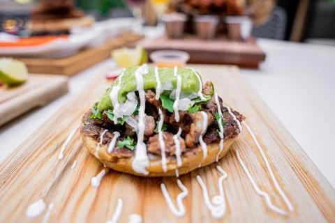 Appetizing Mexican sope with meat. Stock Photos