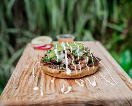 Appetizing Mexican sope with meat. Stock Photos