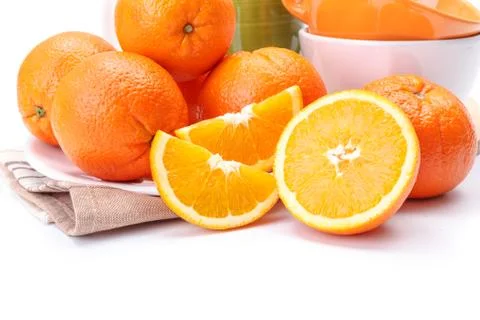 Appetizing oranges on plate Stock Photos