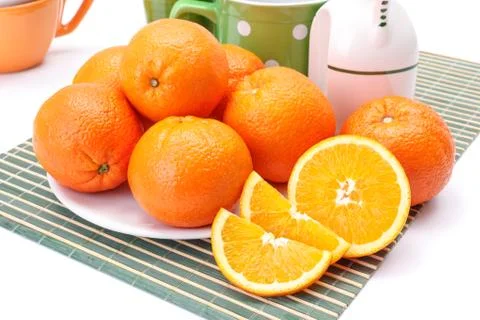 Appetizing oranges on plate Foto stock
