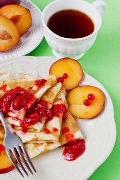 Appetizing pancakes with jam Stock Photos