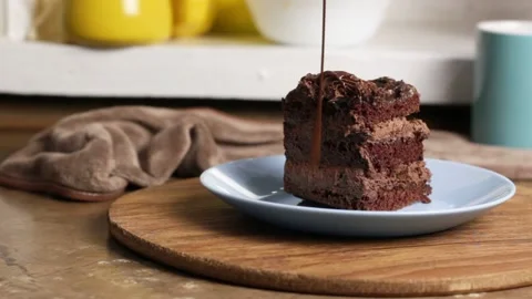 Appetizing piece of chocolate cake, brown cake for breakfast, lunch or dinner 스톡 동영상 222592736