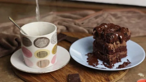 Appetizing piece of chocolate cake, brown cake for breakfast, lunch or dinner Stock Footage 222592834