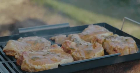 Appetizing pieces of meat on grill, cooking meat, open air, loosening quarantine Stock Footage 131036720