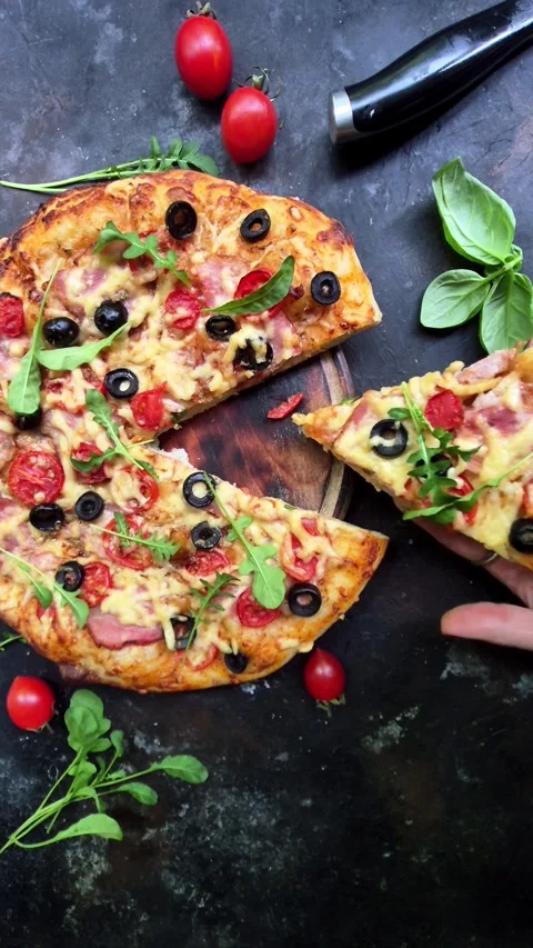 Appetizing pizza with ham, tomatoes Stock Footage 310105008