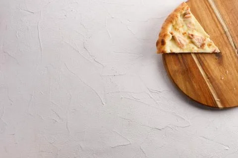 Appetizing pizza with salmon on a light textured background. Delicious food c Stock Photos