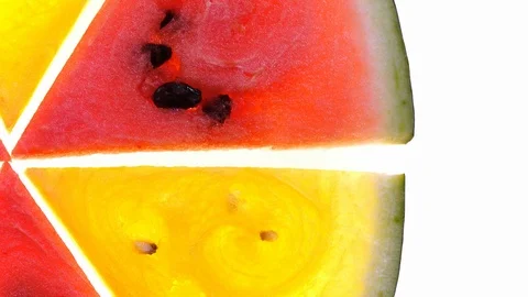 Appetizing red and yellow watermelon slices on white background Vídeo Stock 92194566