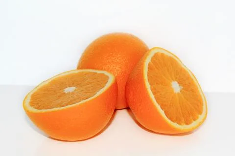 Appetizing ripe orange on white background Stock Photos