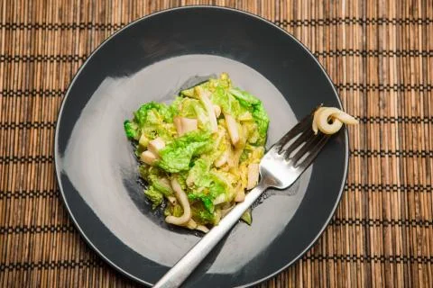 Appetizing salad with squid Stock Photos