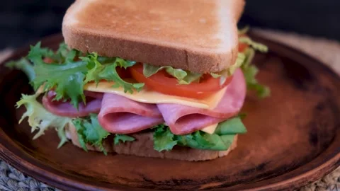 Appetizing sandwich rotation with crispy bread and fresh filling Vídeos de archivo 332788829