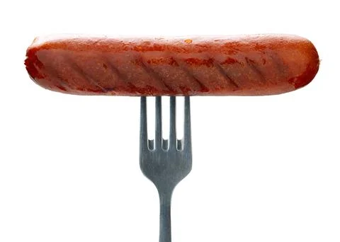 Appetizing sausage on a fork, isolated 스톡 사진