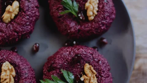 Appetizing serving detail: capturing walnut and beet texture Stock Footage 342200496