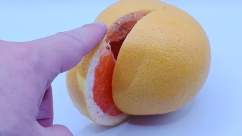 An appetizing slice of grapefruit Stock Footage 331746475