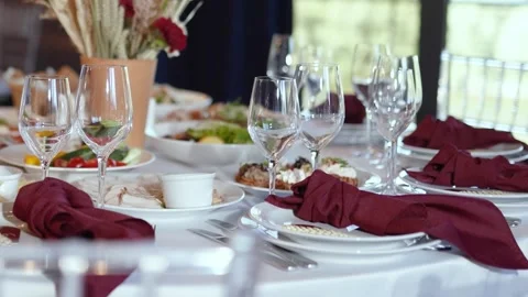 Appetizing slices of different types of cheese and meat a festive banquet table Stock Footage 325986126
