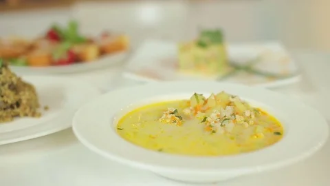 Appetizing soup with potatoes and rice, risotto from pearl barley and chicken Stock Footage 78684722