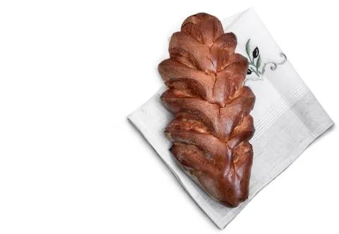 Appetizing sweet white bread on a napkin on a white background. Foto stock