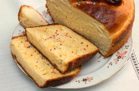 Appetizing sweet white bread on the plate. Stock Photos