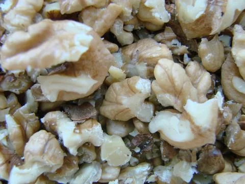 Appetizing Walnut in the shell, eco-friendly, natural, close-up. Many walnuts Foto stock