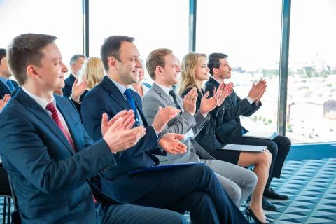 Applauding to speaker Stock Photos