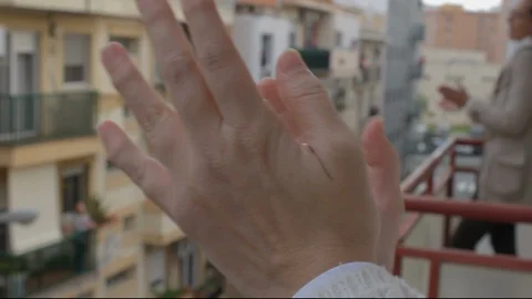 Applause from balconies in Spain Stock-Footage 128827590