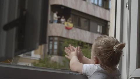 Applause for doctors from grateful people during coronavirus pandemic Stock Footage 129108606