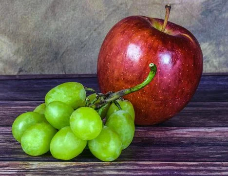 Apple and  grapes Stock Photos