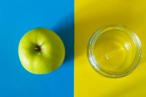 Apple and jar Stock Photos
