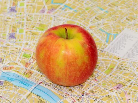 Apple and a map Stock-Fotos