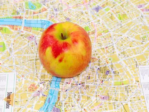 Apple and a map Stock Photos