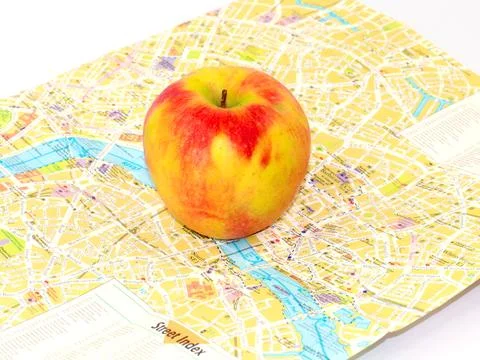 Apple and a map Stock Photos