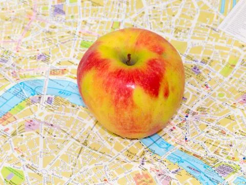 Apple and a map Stock Photos