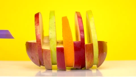 Apple and orange drilling Stock Footage 168832216