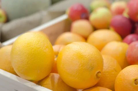 Apple and orange on stack Foto stock