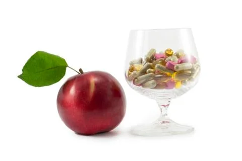Apple and pills Stock Photos