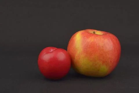 Apple and plum Stock Photos