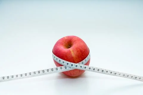 Apple and sizer (diet concept) Stock Photos