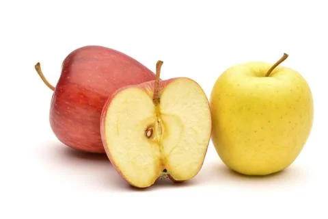 Apple and slice on a white background Stock Photos