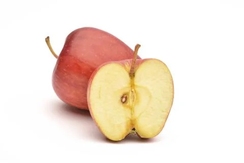 Apple and slice on a white background Stock Photos
