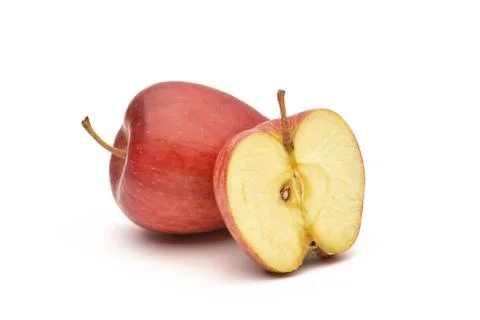 Apple and slice on a white background Stock Photos
