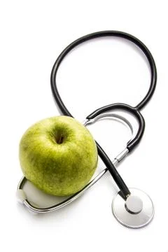 Apple and stethoscope Stock Photos