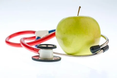 Apple and stethoscope Stock Photos