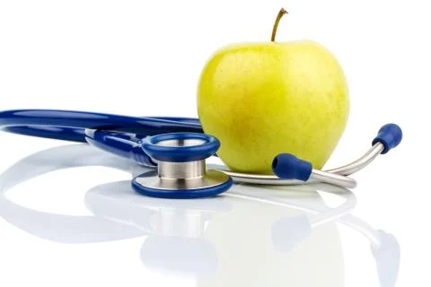 Apple and stethoscope Stock Photos